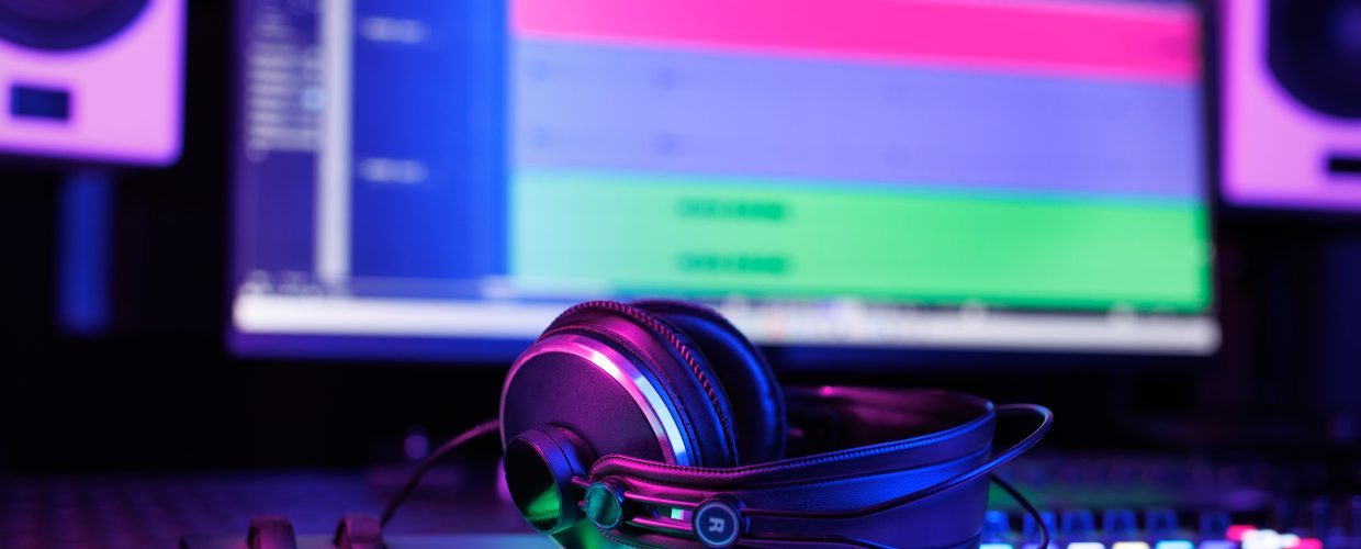Modern headphones and a director's console for professional control of music and speech